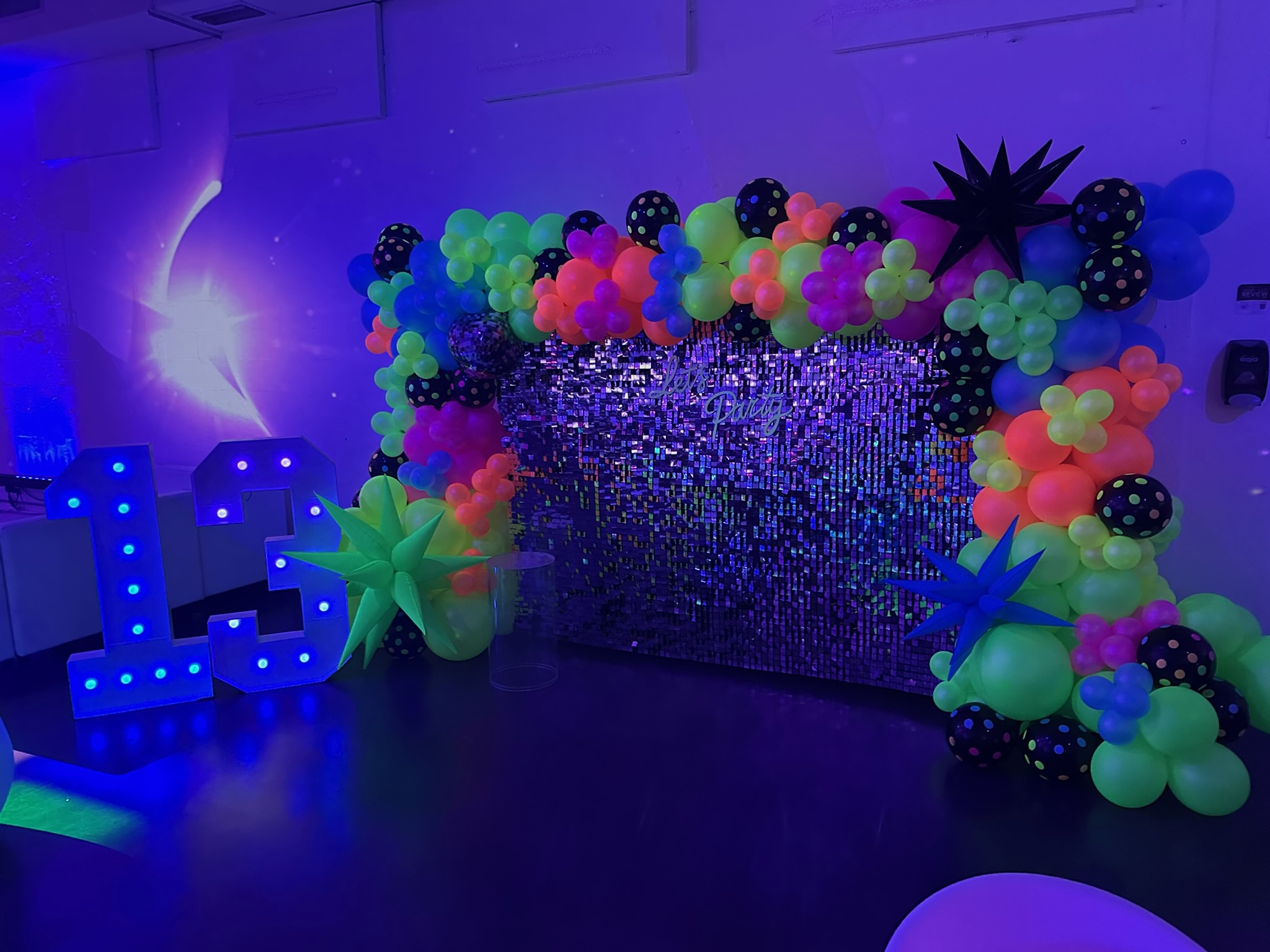 13th birthday celebration at The 305 Club with colorful decorations and party guests